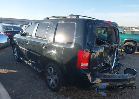 2012 Honda Pilot Touring z USA, uszkodzony, nr VIN 5FNYF4H97CB037239